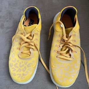 Yellow Nike running shoes